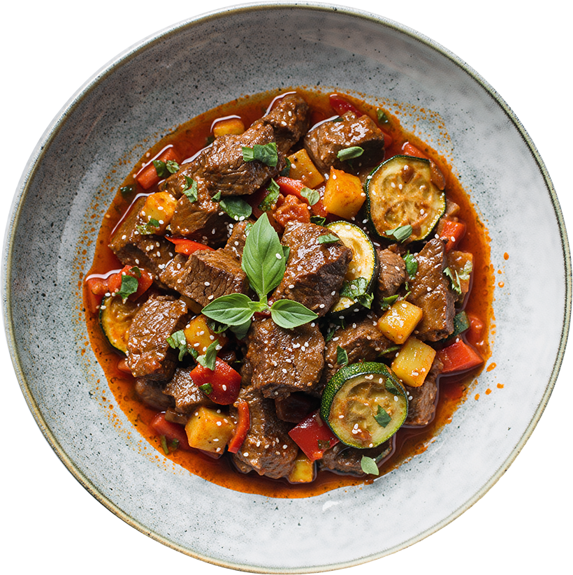 Mediterraner Rindertopf mit Zucchini, Paprika, Kartoffelwürfeln und frischen Kräutern